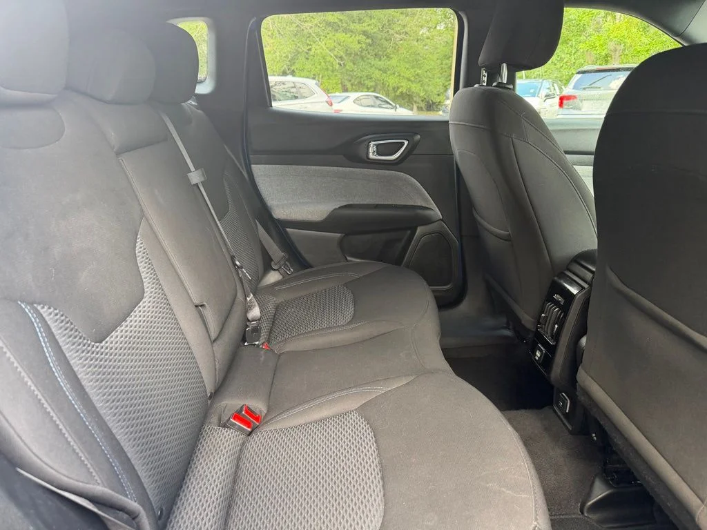 Used 2023 Laser Blue Jeep Sport image 8