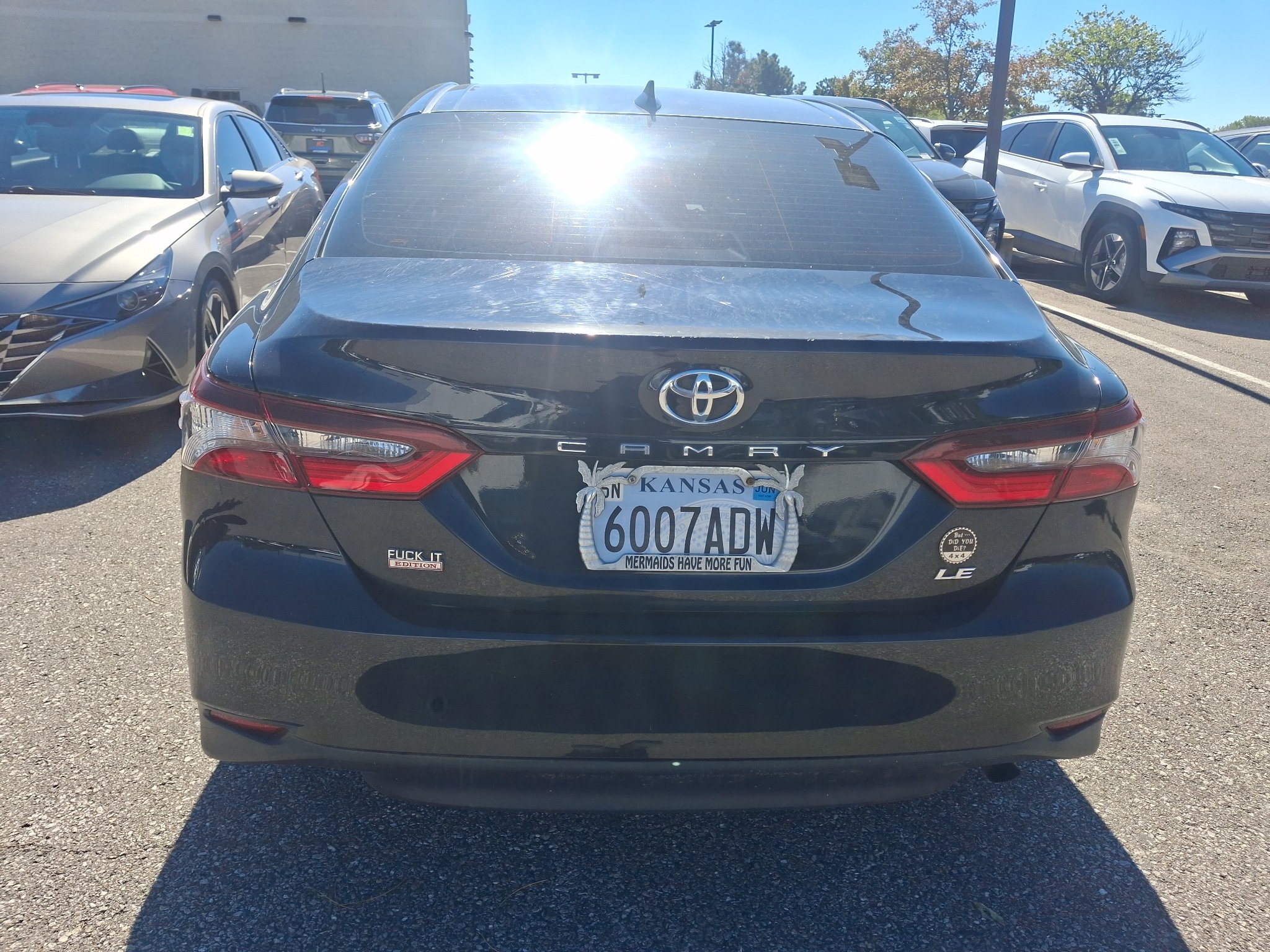 Used 2022 Midnight Black Metallic Toyota LE image 8