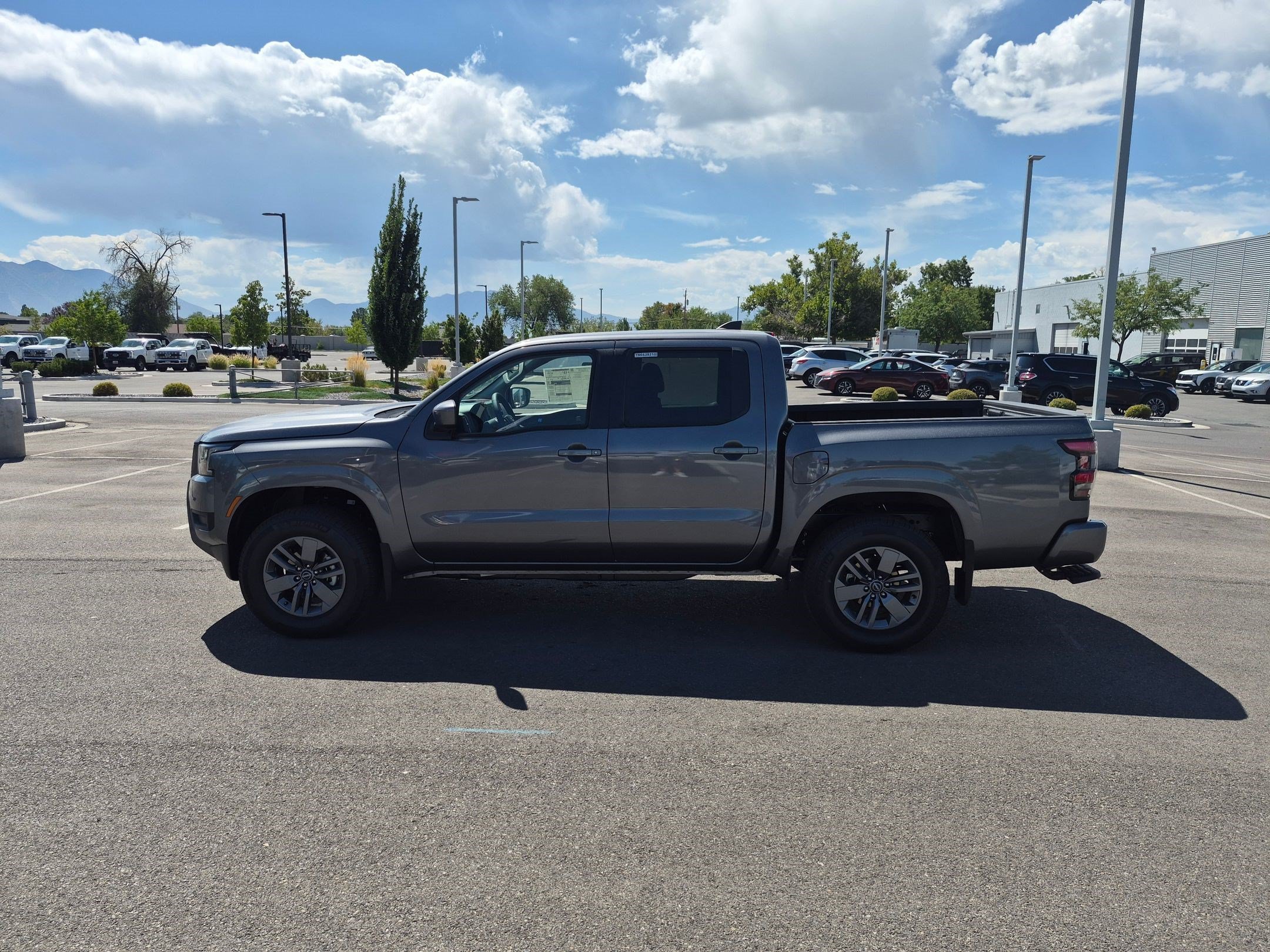 New 2026 Gun Metallic Nissan Crew Cab SV image 7