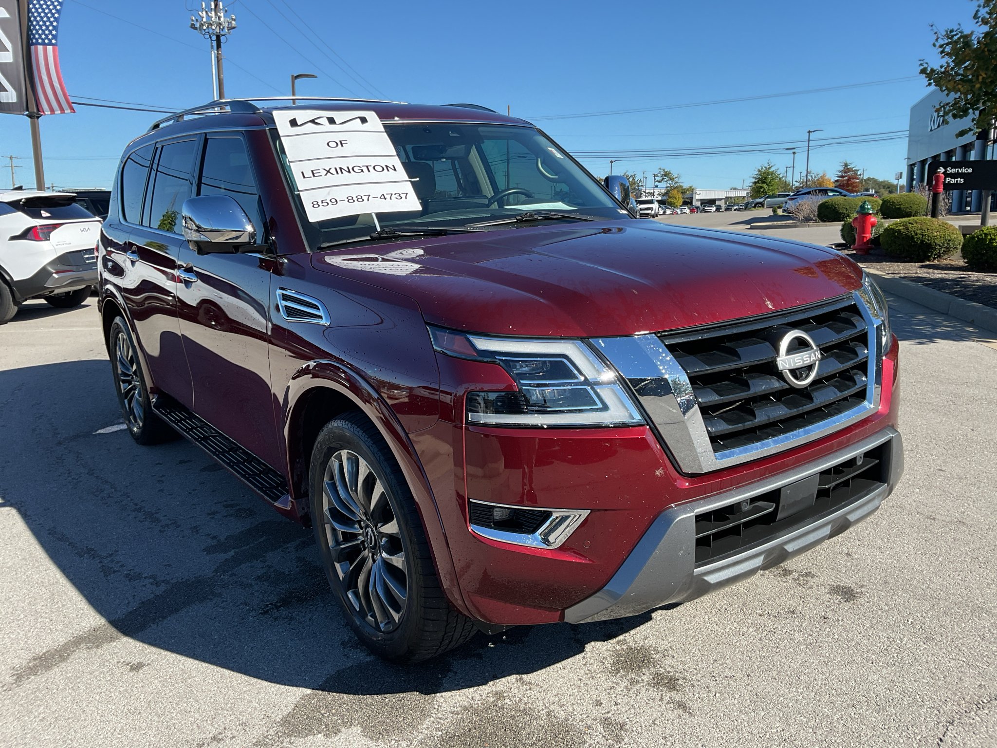Used 2023 Coulis Red Pearl Nissan Platinum image 2