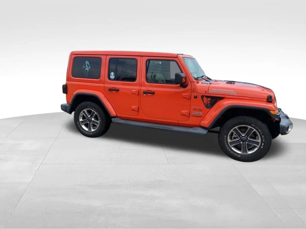 Used 2019 Orange Jeep Unlimited Sahara image 10