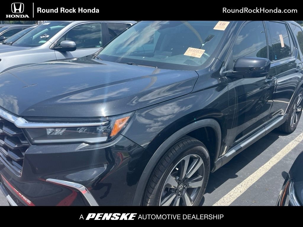 Certified Used 2025 Crystal Black Pearl Honda Touring image 1