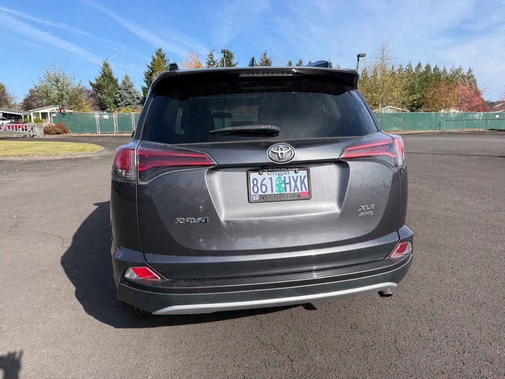 Used 2016 Magnetic Gray Metallic Toyota XLE image 6