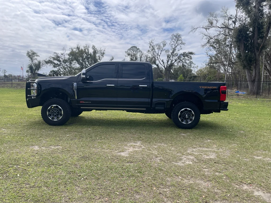 Used 2024 Black Ford Platinum Crew 4x4 H/O w/Tremor pkg image 2