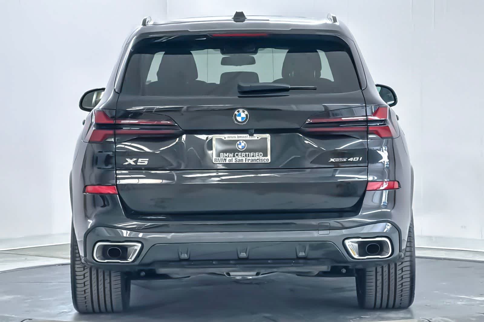 Certified Used 2024 Black Sapphire Metallic BMW xDrive40i image 7