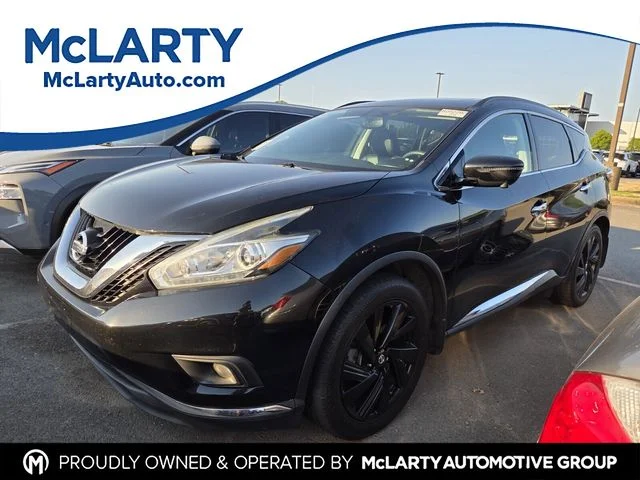 Used 2017 Black Nissan Platinum image 1