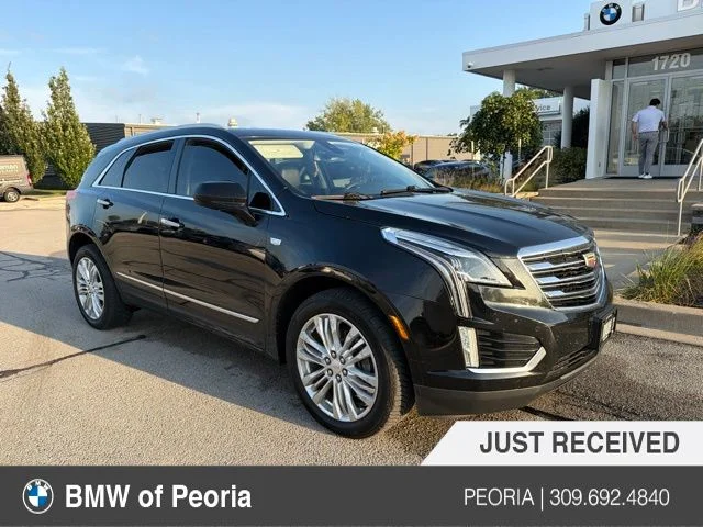 Used 2018 Black Cadillac Premium Luxury image 1