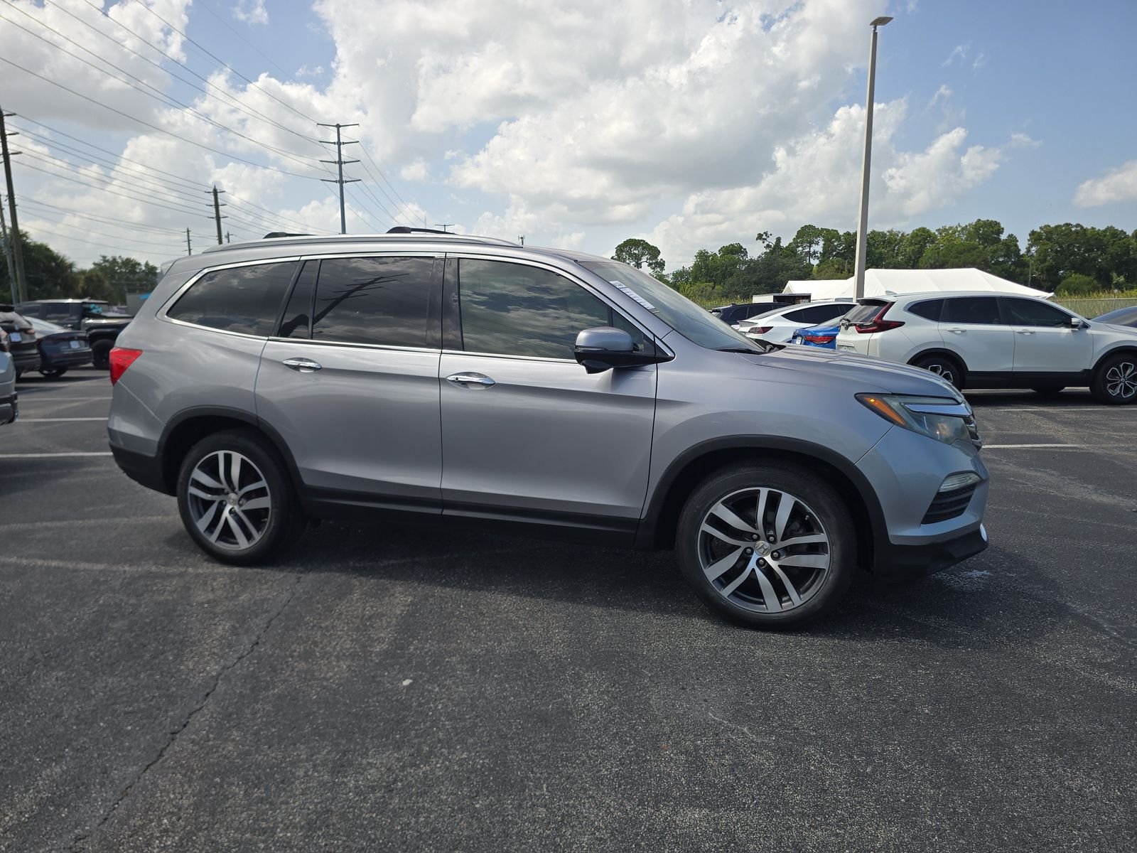 Used 2016 Honda Pilot Touring with VIN 5FNYF6H9XGB006584 for sale in Port Richey, FL