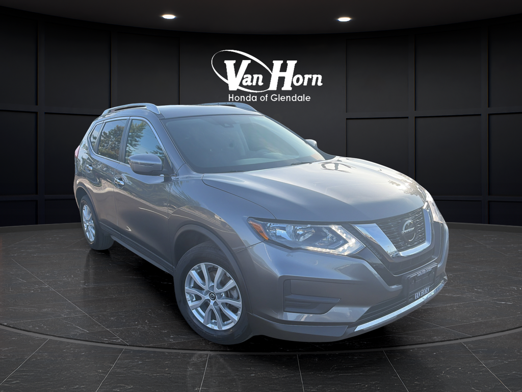 Used 2019 Gun Metallic Nissan SV image 1