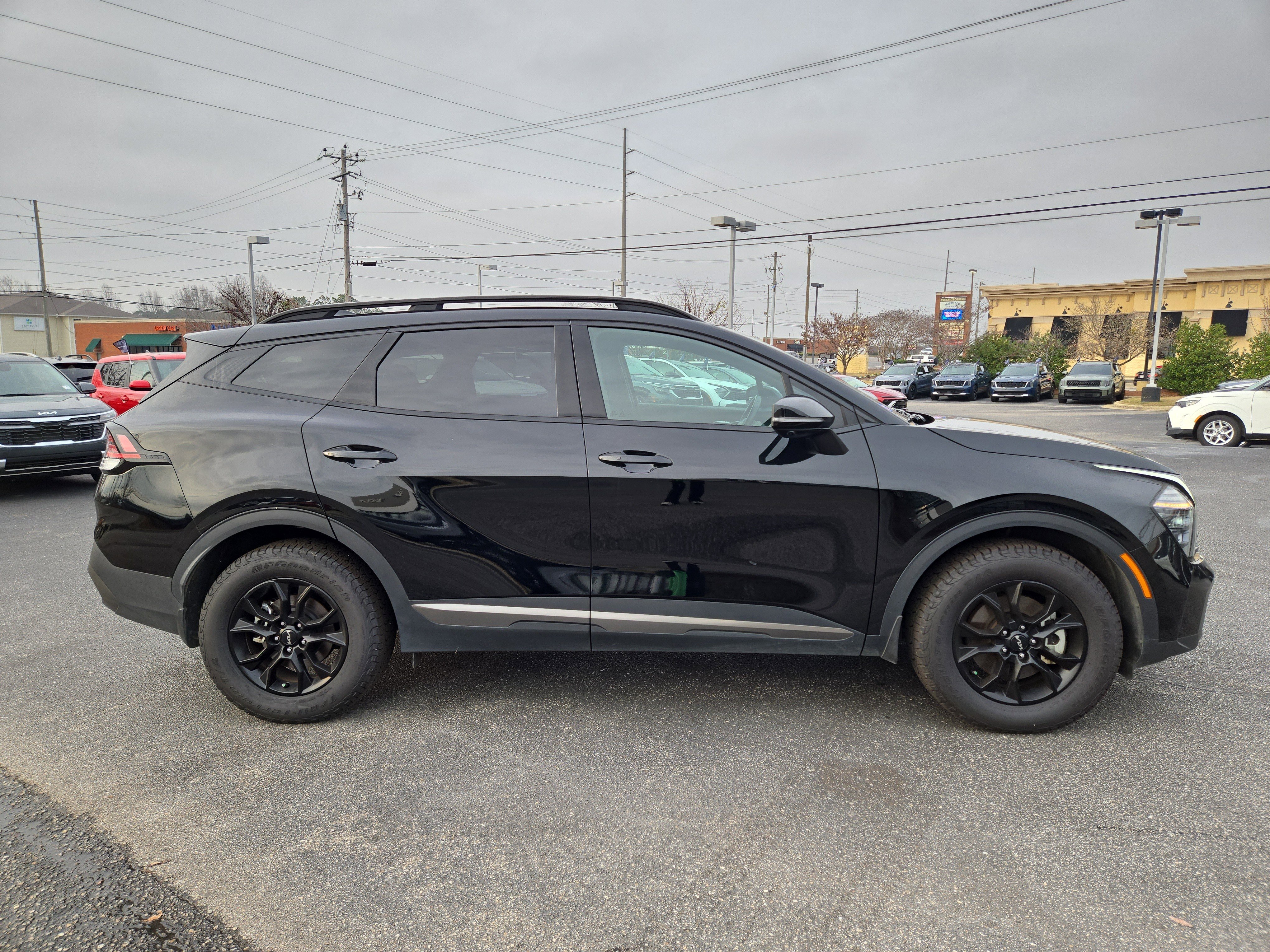 Used 2024 Ebony Black Kia X-Pro Prestige image 5