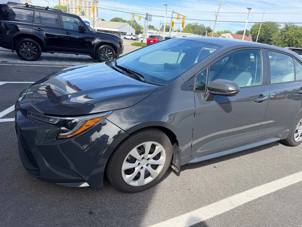 Used 2024 Blue Toyota LE image 1
