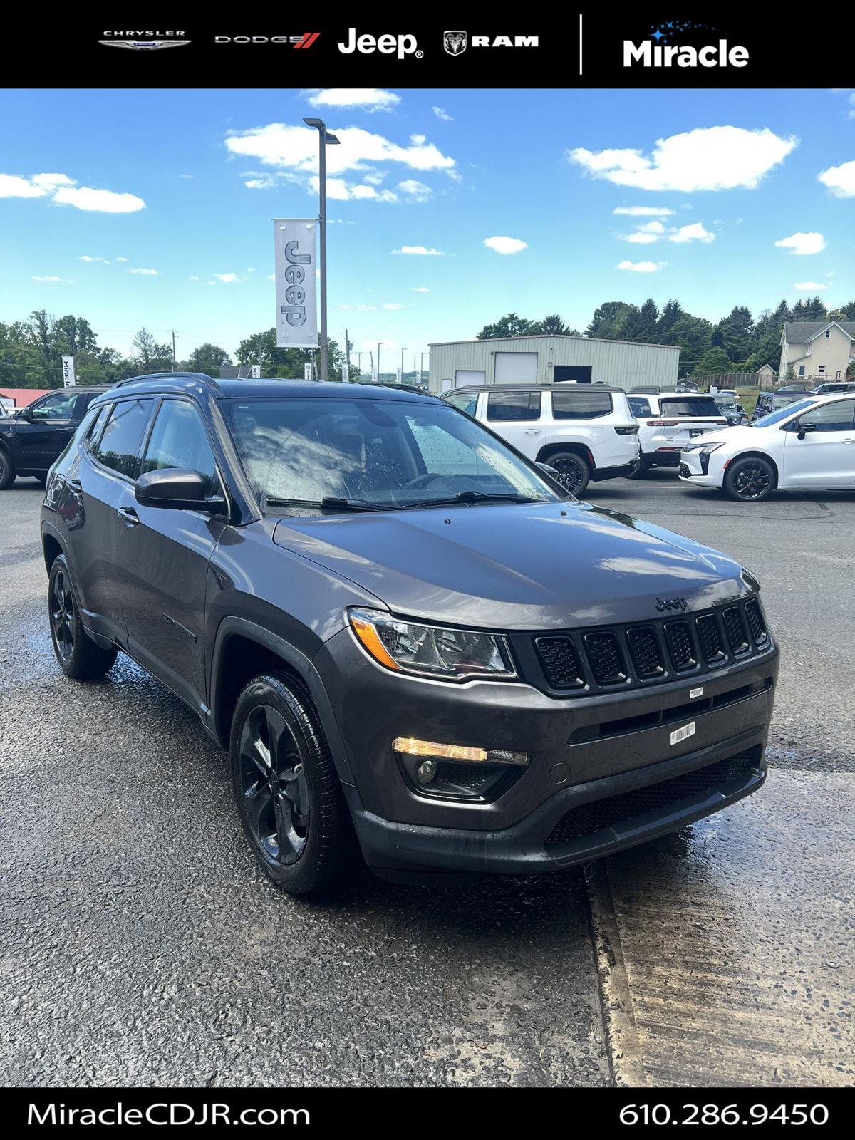 Used 2021 GRANITE CRYSTAL JEEP ALTITUDE image 1