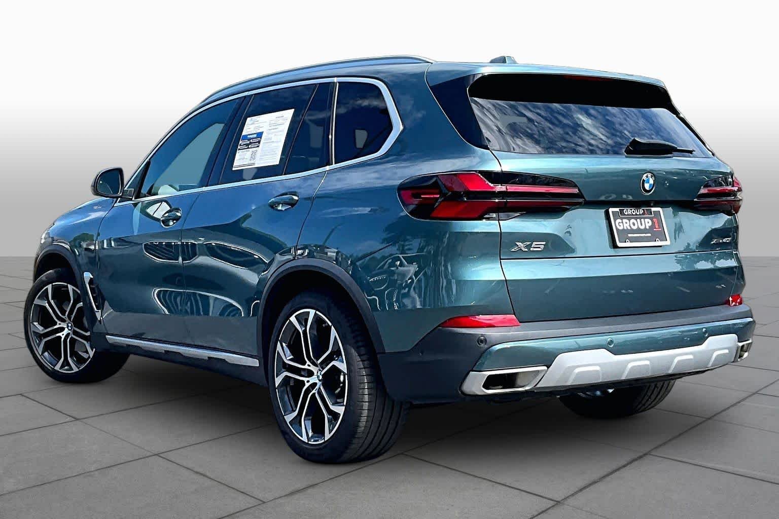 Used 2024 Blue Ridge Mountain Metallic BMW xDrive40i image 12