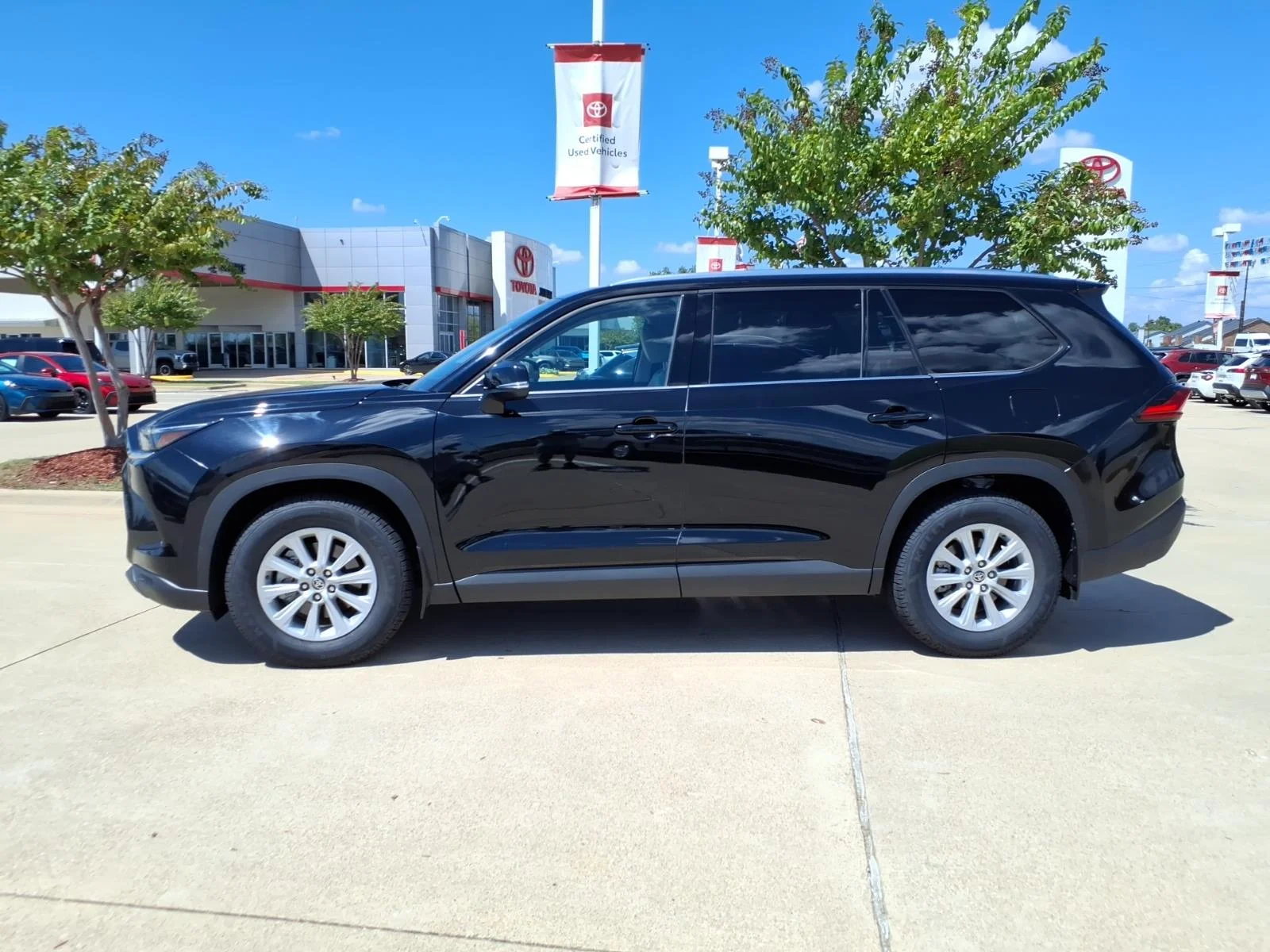 Certified Used 2024 Midnight Black Metallic Toyota XLE image 2