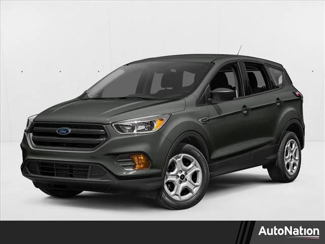 Used 2017 Magnetic Metallic Ford SE image 1