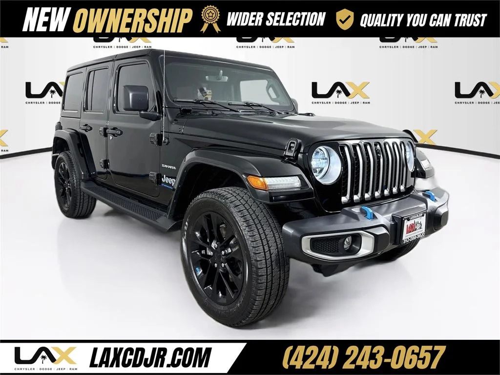 Used 2023 Black Jeep Sahara 4xe image 1