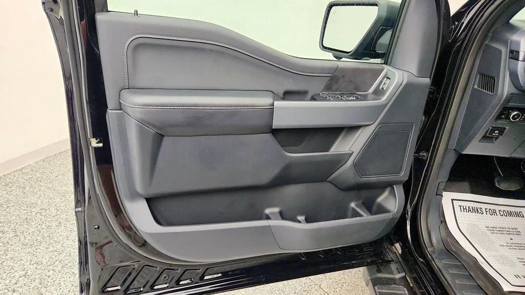 Used 2025 Agate Black Metallic Ford XLT 4WD SuperCrew 5.5