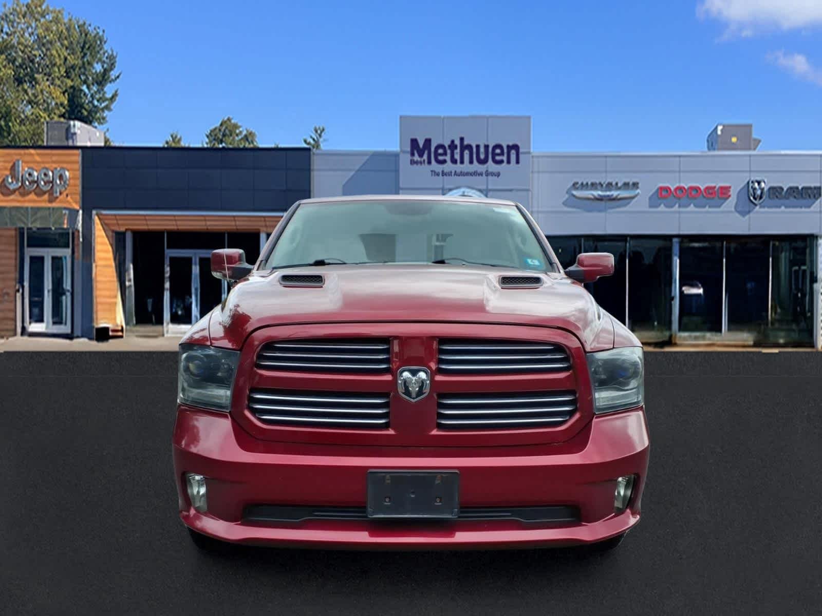 Used 2015 Deep Cherry Red Crystal Pearlcoat Ram Sport image 2