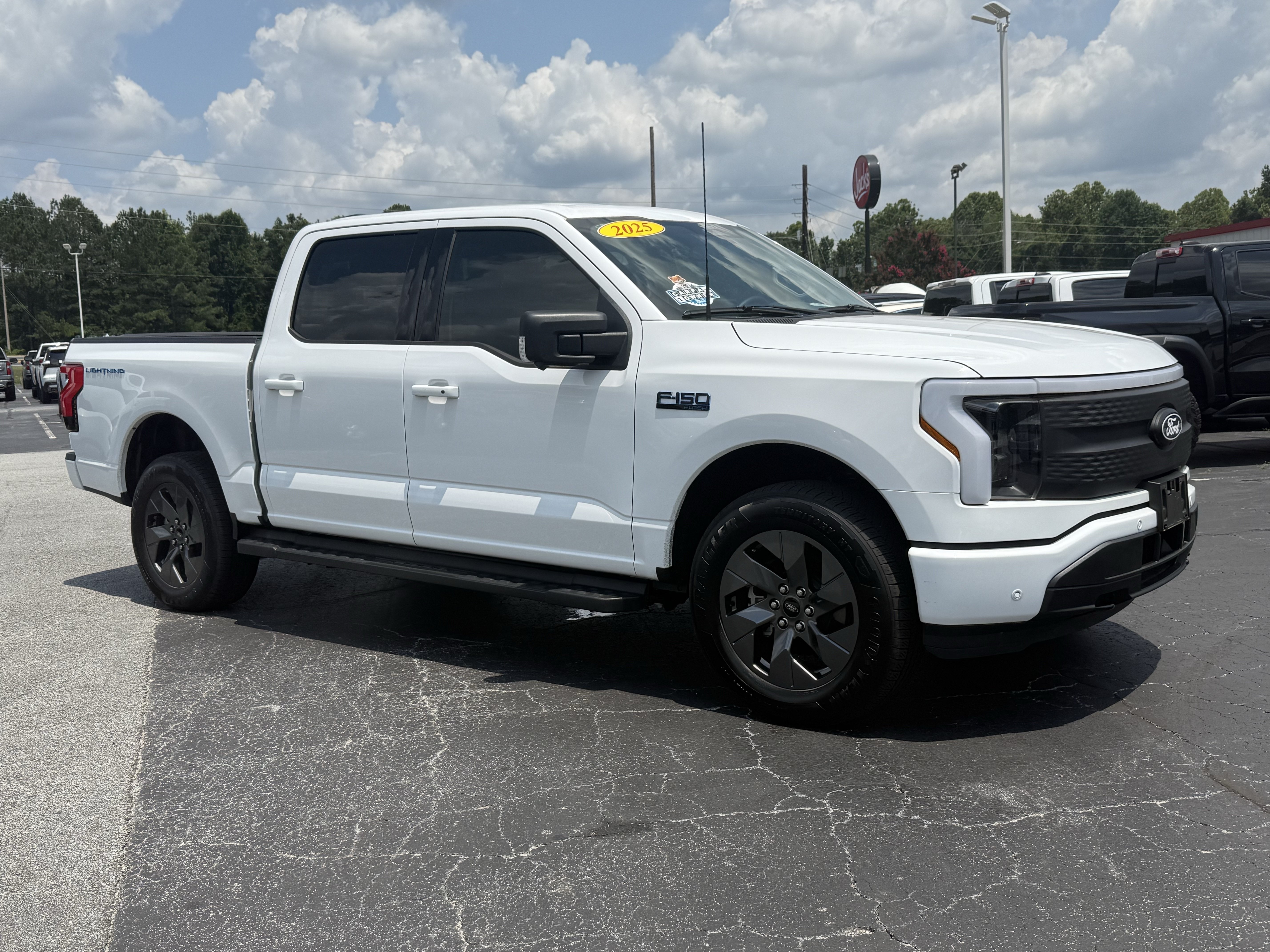 Used 2025 Ford F-150 Lightning Flash with VIN 1FT6W3L77SWG05099 for sale in Carrollton, GA