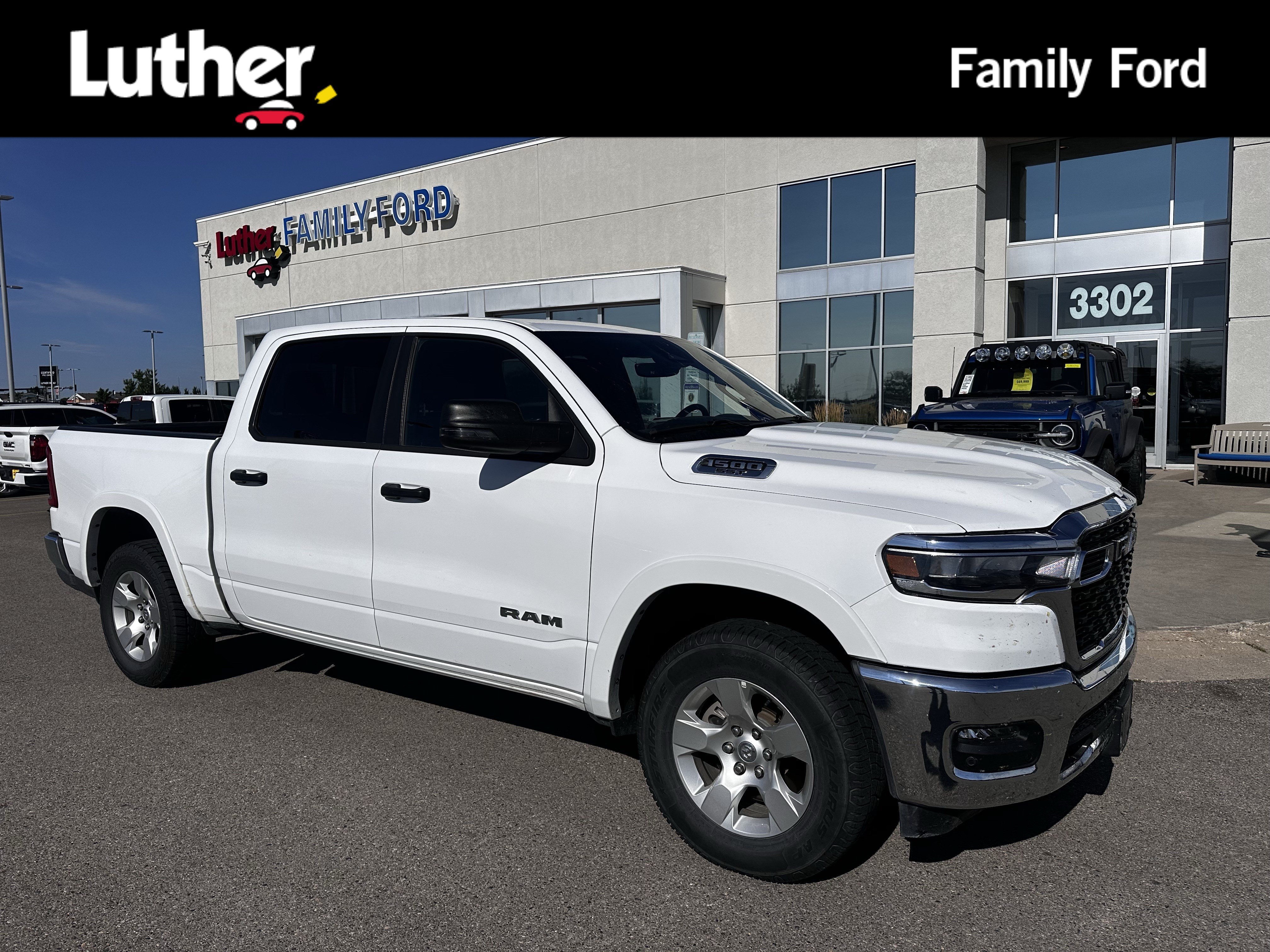 Used 2025 Bright White Clearcoat Ram Big Horn image 1