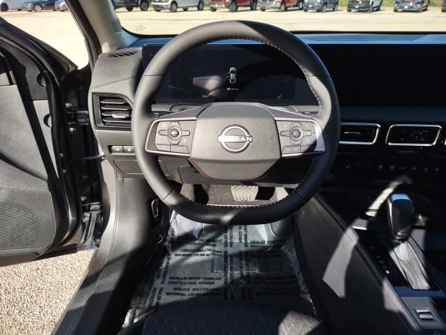Used 2027 Gun Metallic Nissan SV image 13