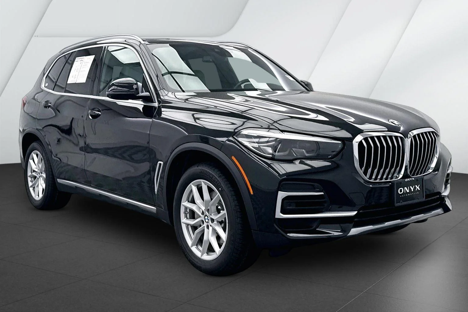 Used 2023 Black Sapphire Metallic BMW xDrive40i image 1
