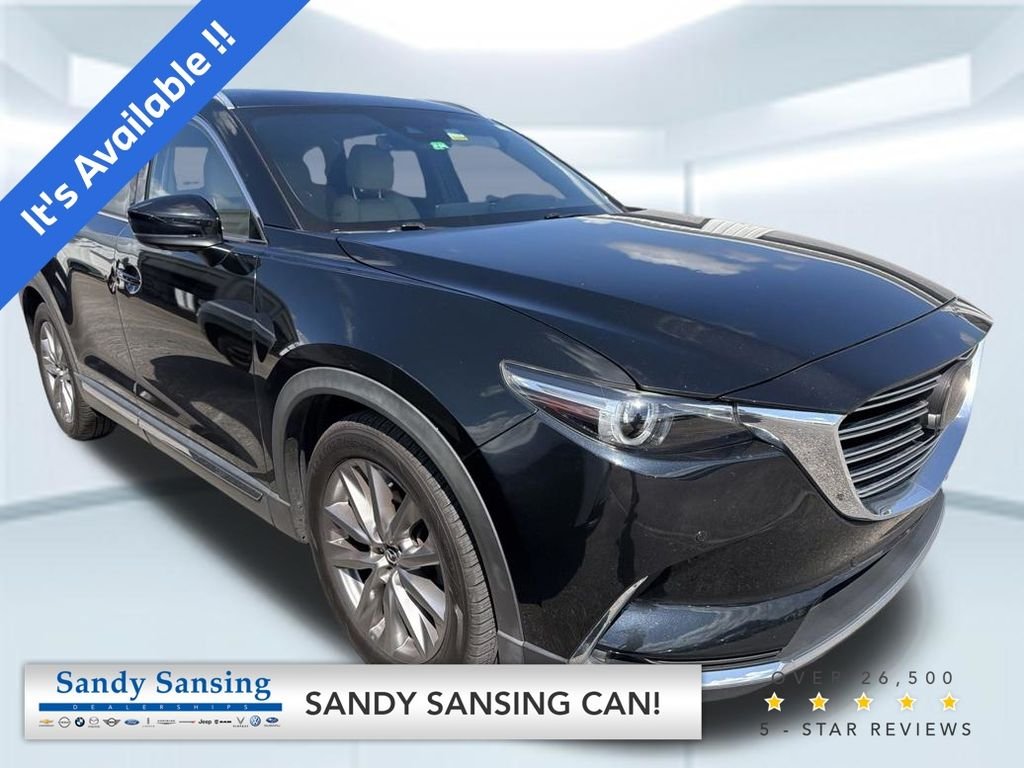 Used 2021 Black Mazda Grand Touring image 1