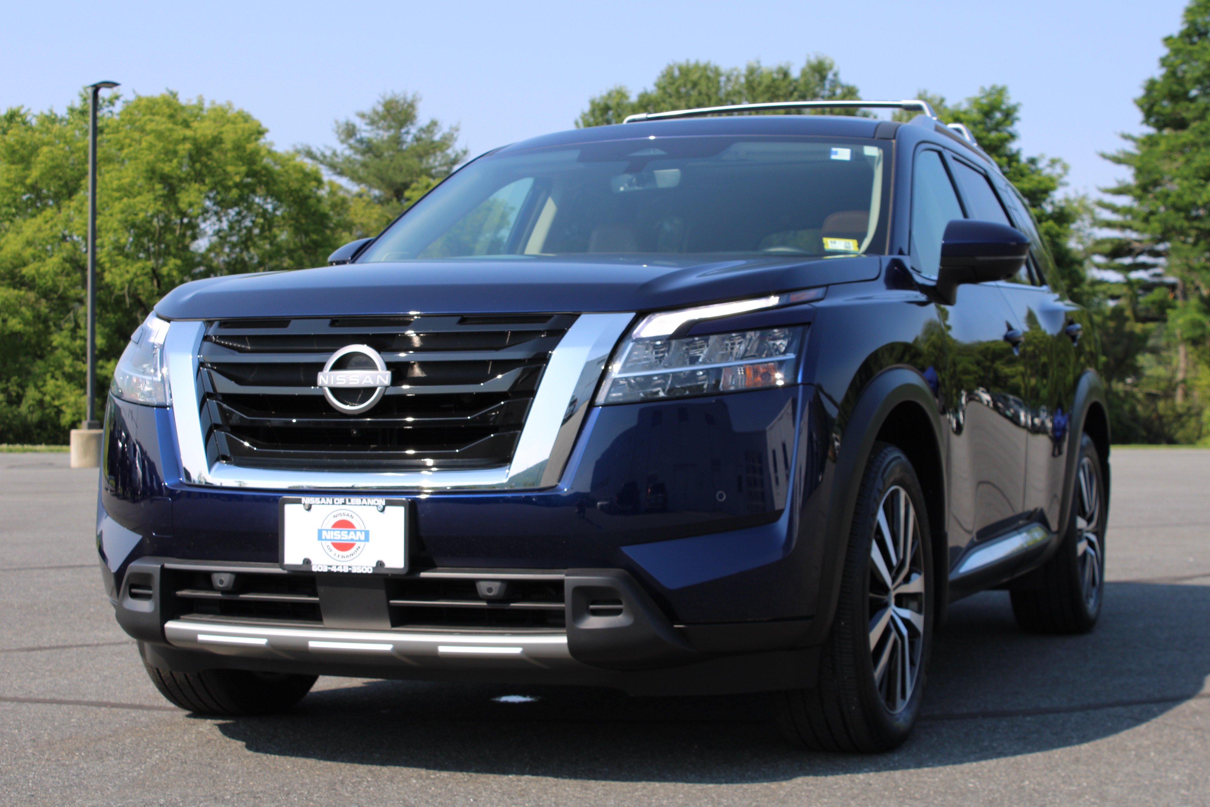 Used 2024 Deep Ocean Blue Pearl Nissan Platinum image 1