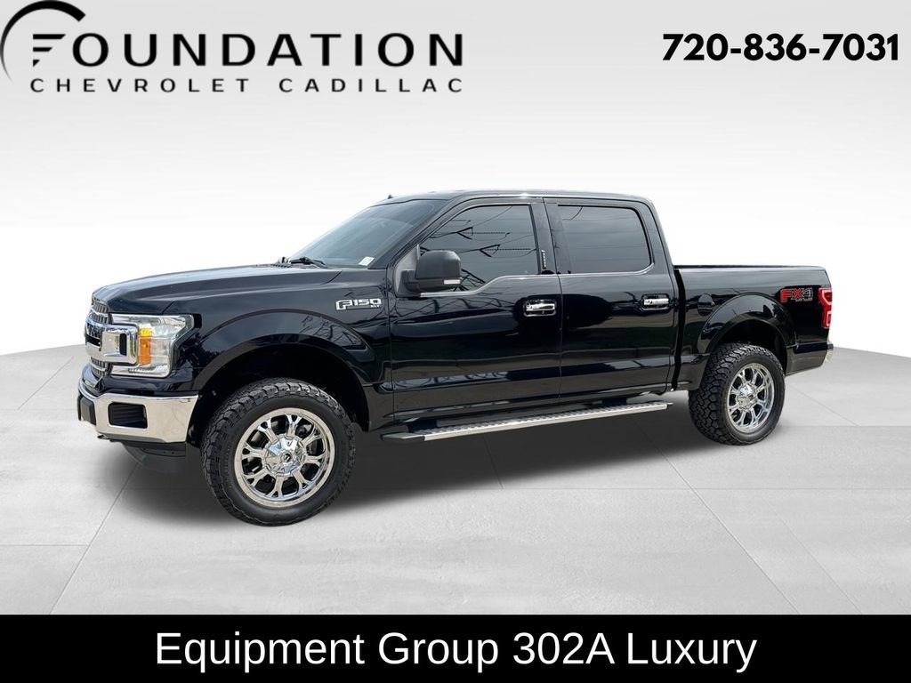 Used 2020 Black Ford XLT image 1