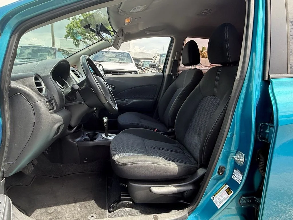 Used 2014 Metallic Peacock Nissan SV image 9