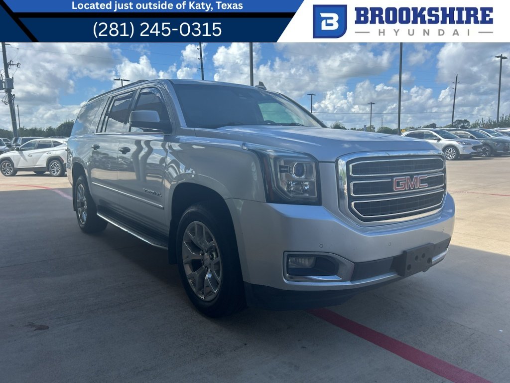 Used 2016 Quicksilver Metallic GMC SLT image 1