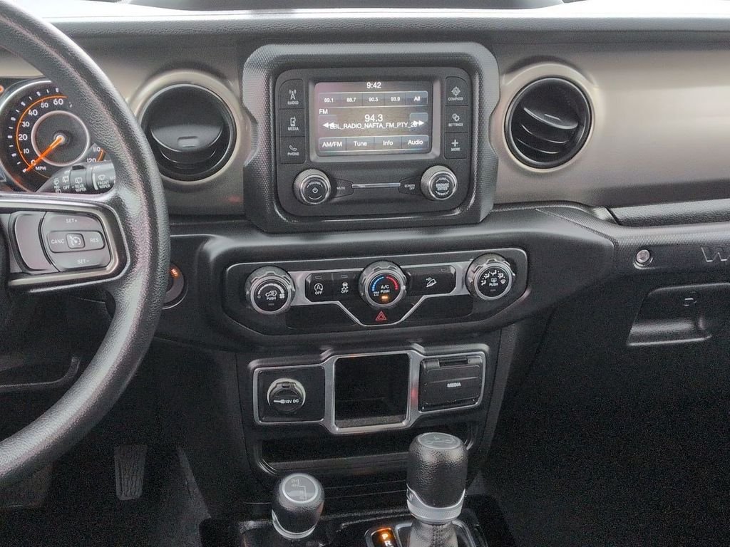 Used 2018 Bright White Clearcoat Jeep Unlimited Sport image 16