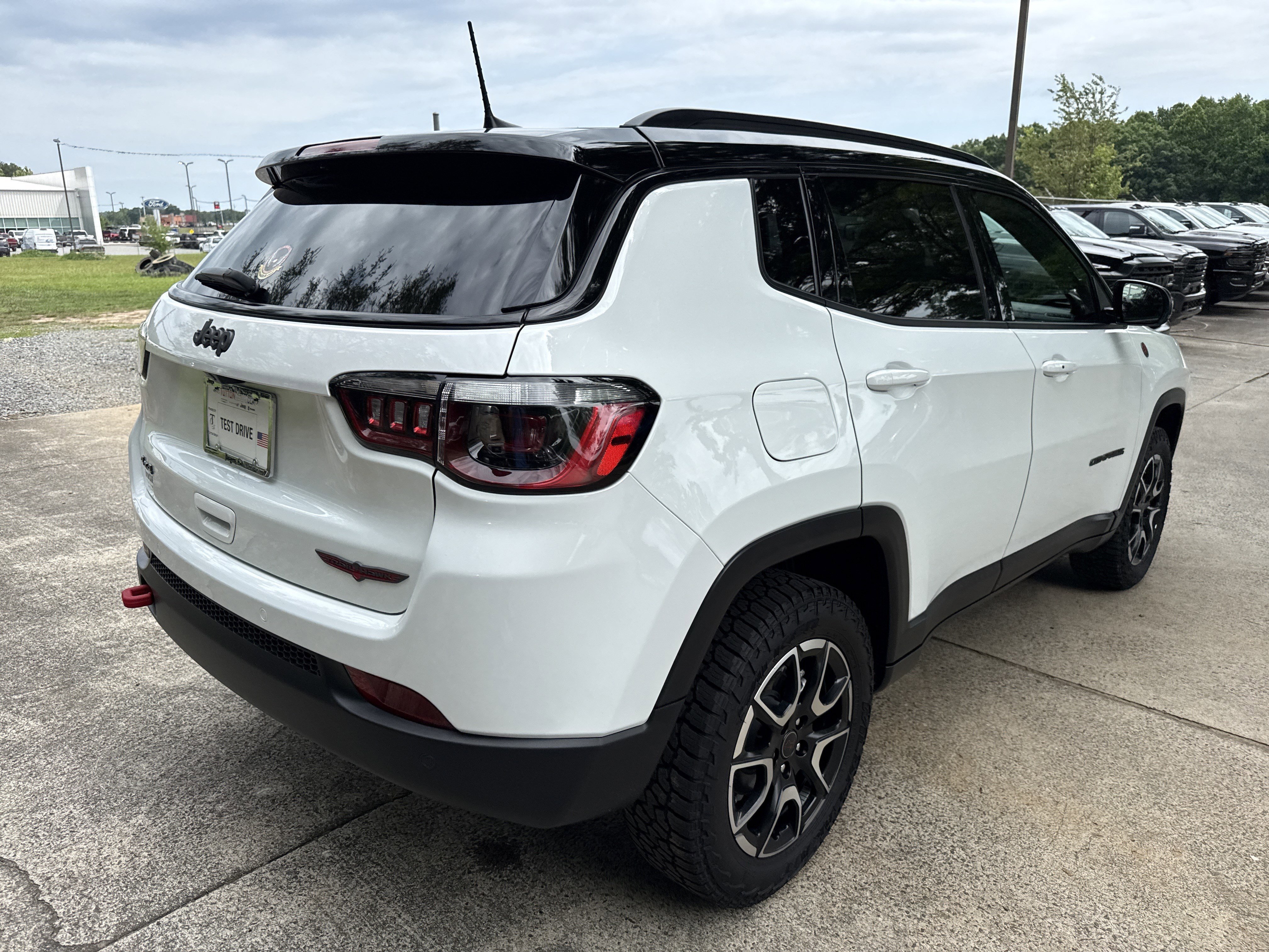 Used 2025 Bright White Clearcoat Jeep Trailhawk image 7