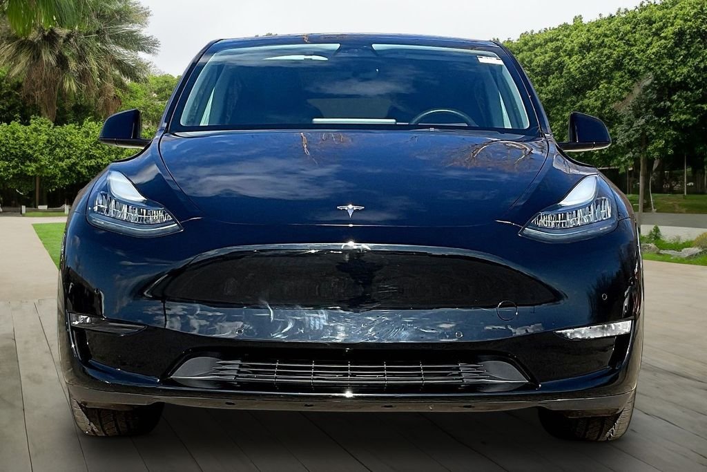 Used 2022 Tesla Model Y Long Range with VIN 7SAYGAEEXNF517973 for sale in Naperville, IL