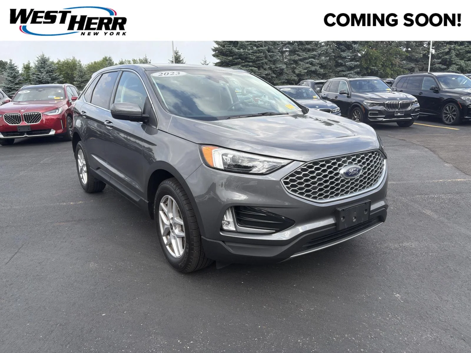 Used 2023 Carbonized Gray Ford SEL image 1