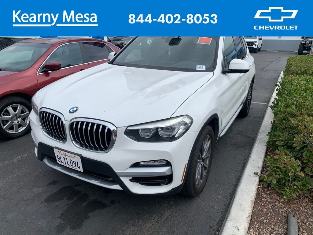 Used 2019 White BMW sDrive30i image 1