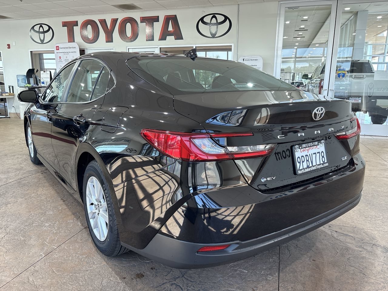 Certified Used 2025 Midnight Black Metallic Toyota LE image 8