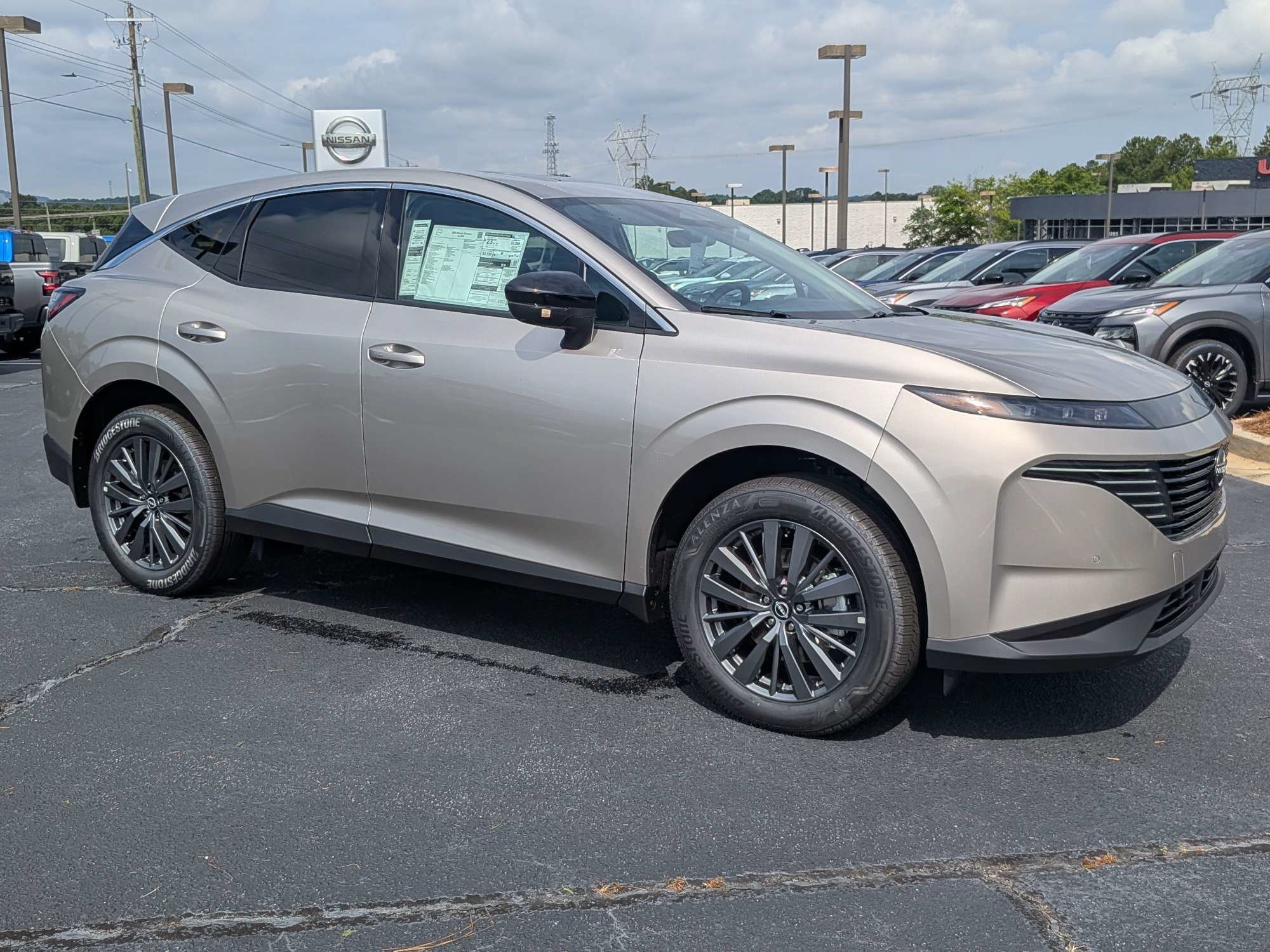 New 2026 Gold Nissan SL image 1
