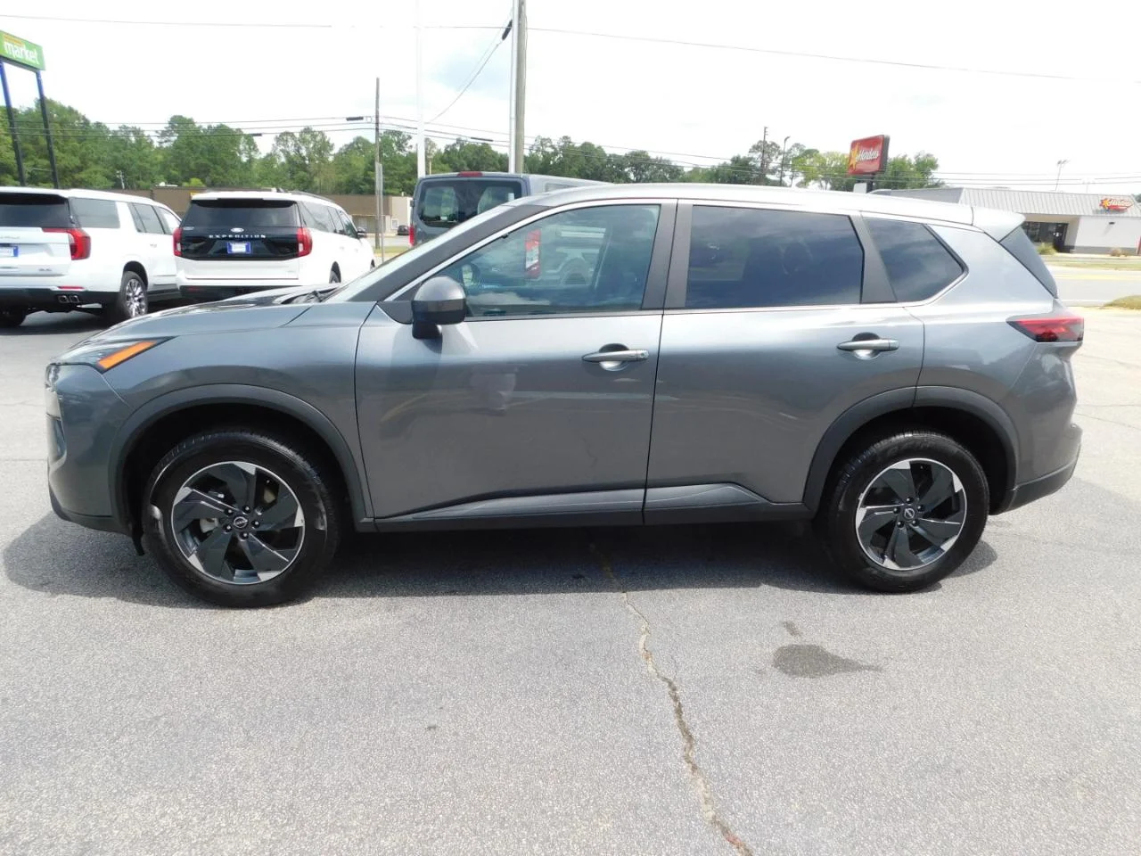 Used 2025 Gun Metallic Nissan AWD SV image 5