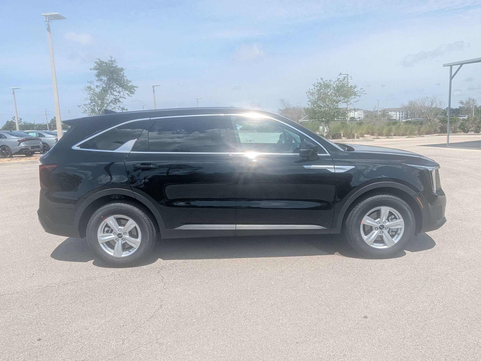 New 2026 Ebony Black Kia LX image 4