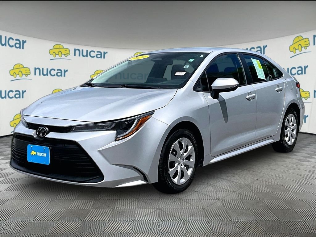 Used 2024 Classic Silver Metallic Toyota LE image 3