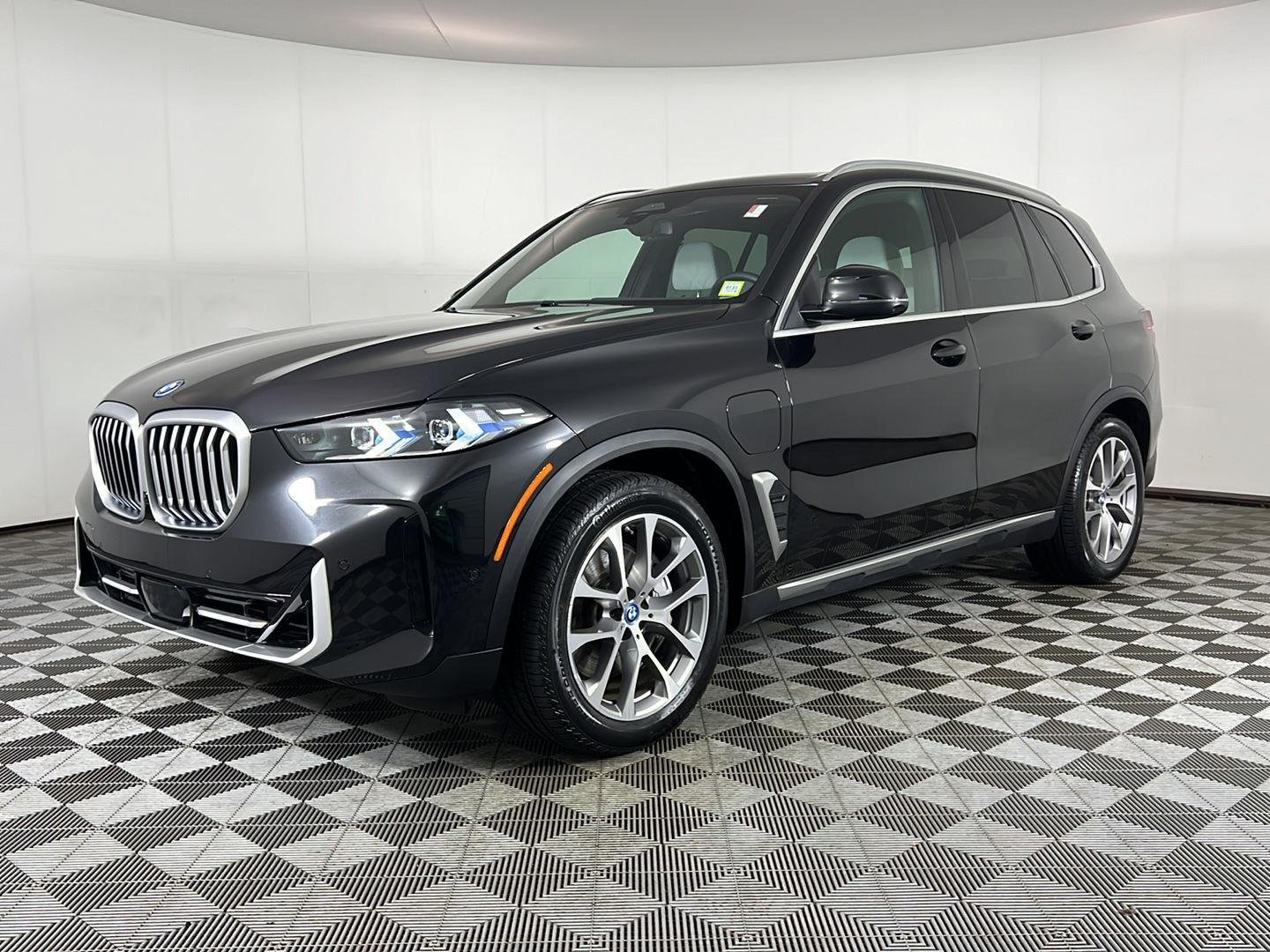 Certified Used 2024 Black Sapphire Metallic BMW xDrive50e image 10