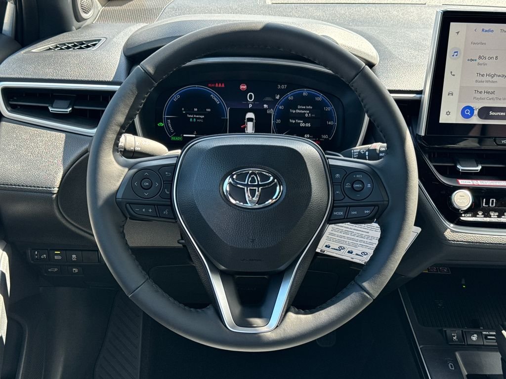 New 2026 Silver Toyota Hybrid XSE image 12