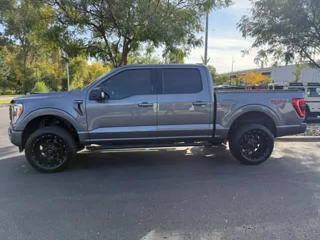 Used 2021 Ford F-150 XLT with VIN 1FTEW1EP3MKD98184 for sale in Minneapolis, Minnesota