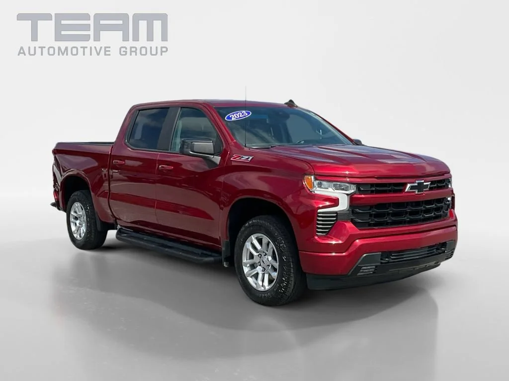 Used 2023 Radiant Red Tintcoat Chevrolet RST image 1