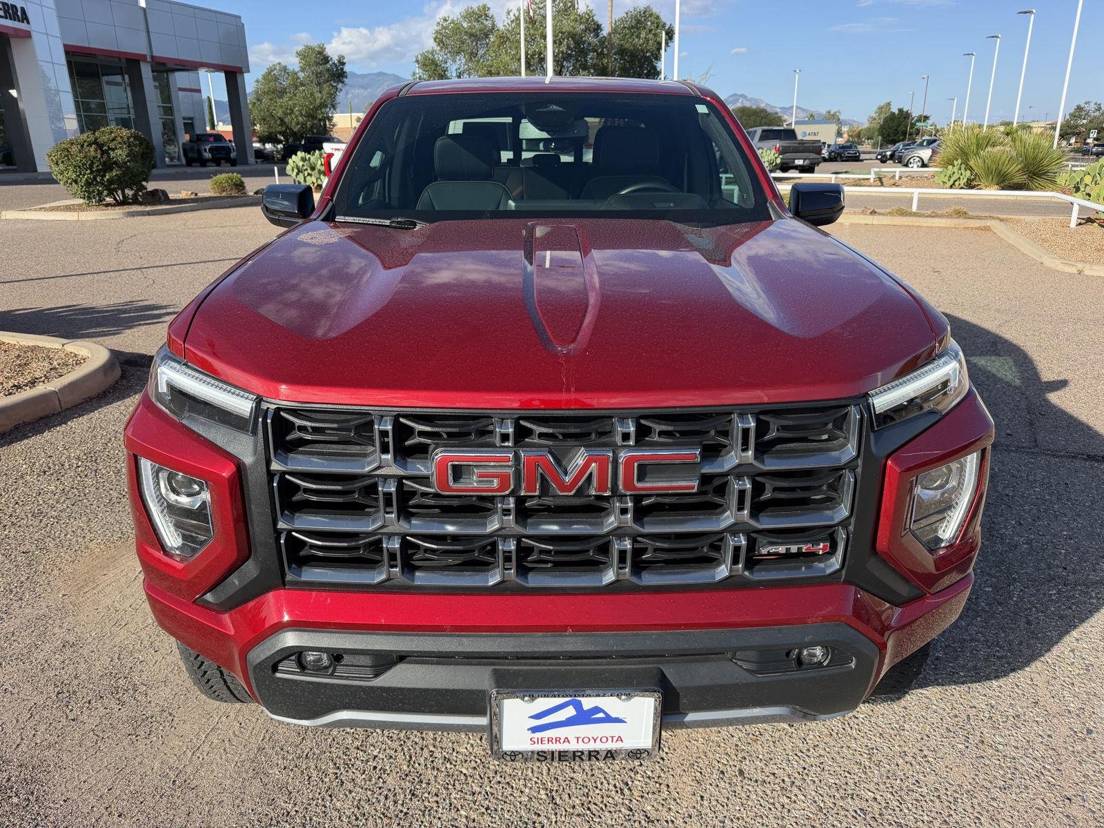 Used 2025 Volcanic Red Tintcoat GMC 4WD AT4 image 9