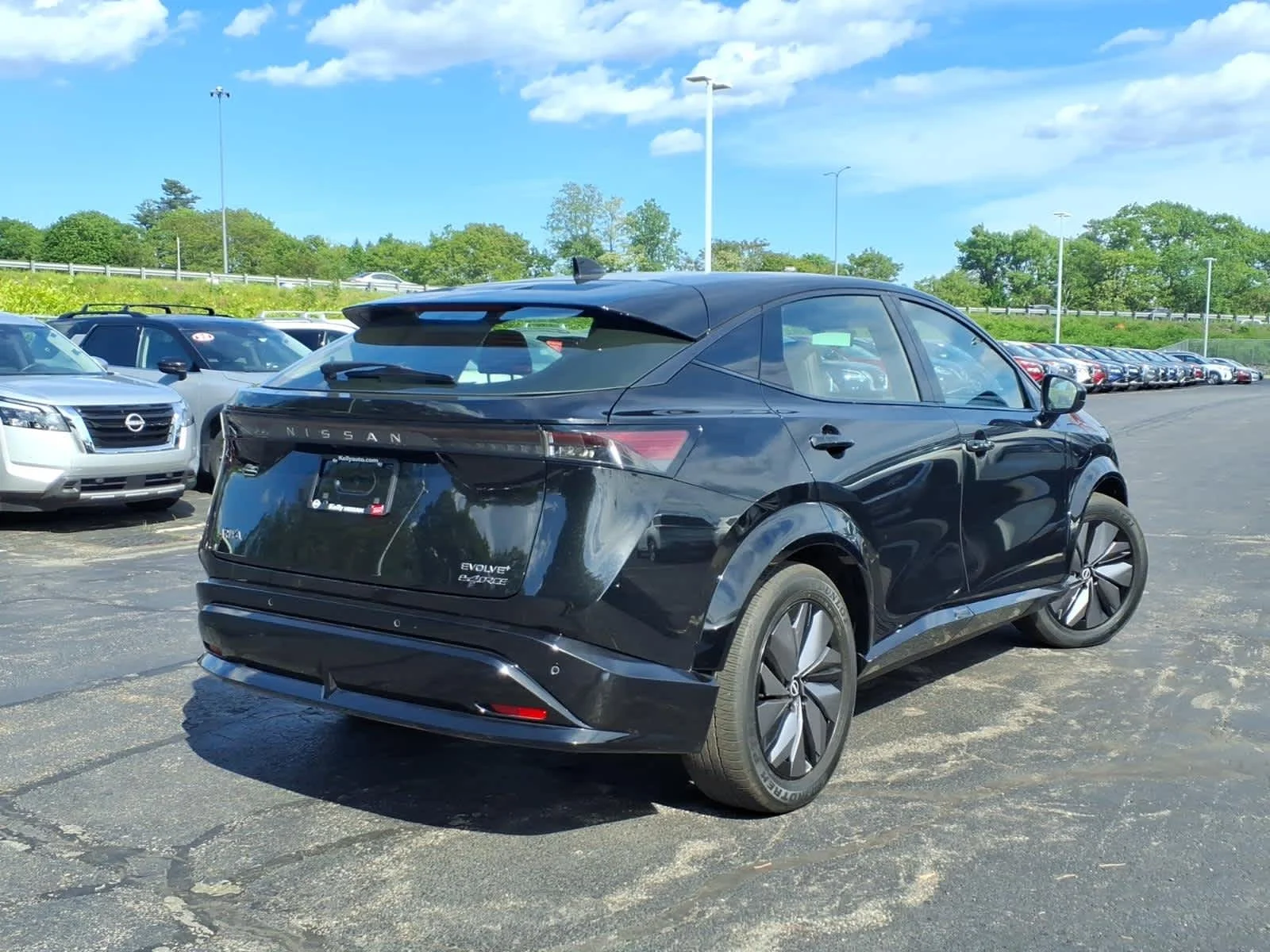 Certified Used 2024 Black Diamond Pearl Nissan EVOLVE+ image 5