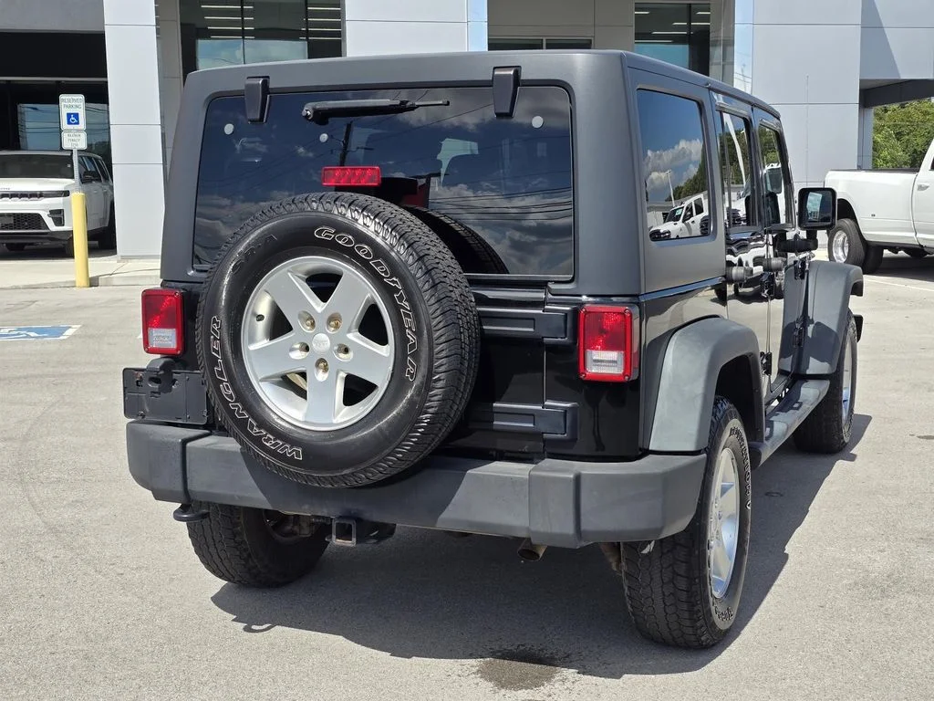 Used 2014 Black Clearcoat Jeep Sport image 10