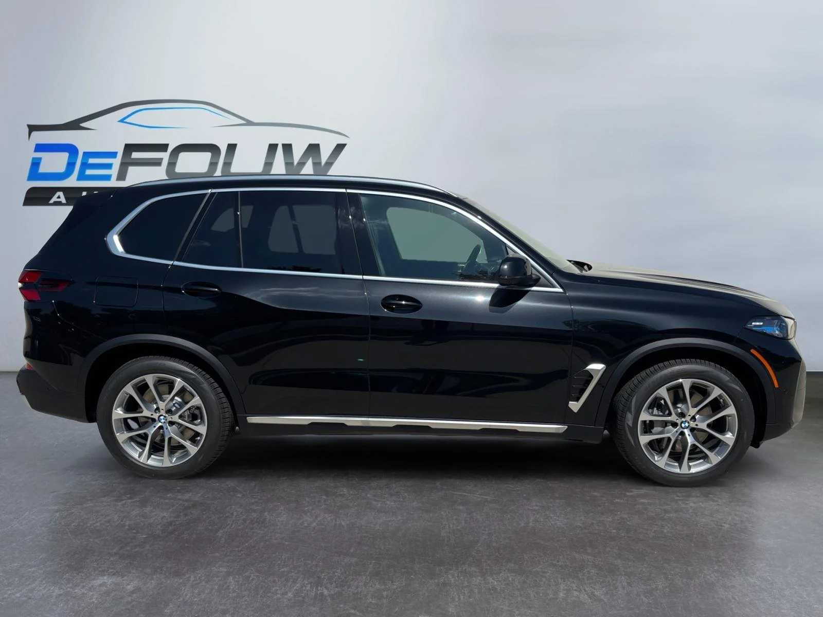 New 2026 Black Sapphire Metallic BMW xDrive50e image 12