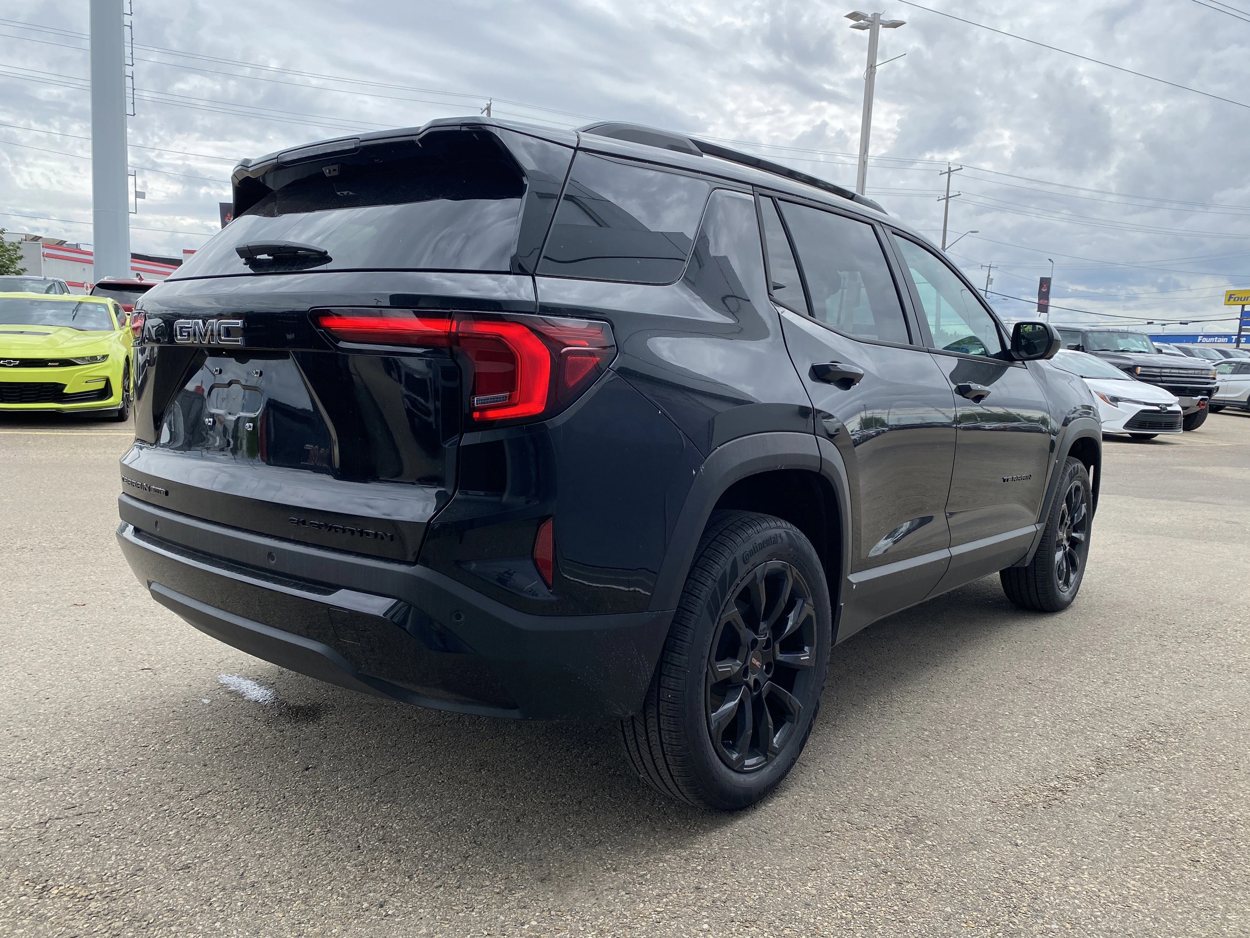 New 2026 EBONY TWILIGHT METALLIC GMC AWD Elevation image 7
